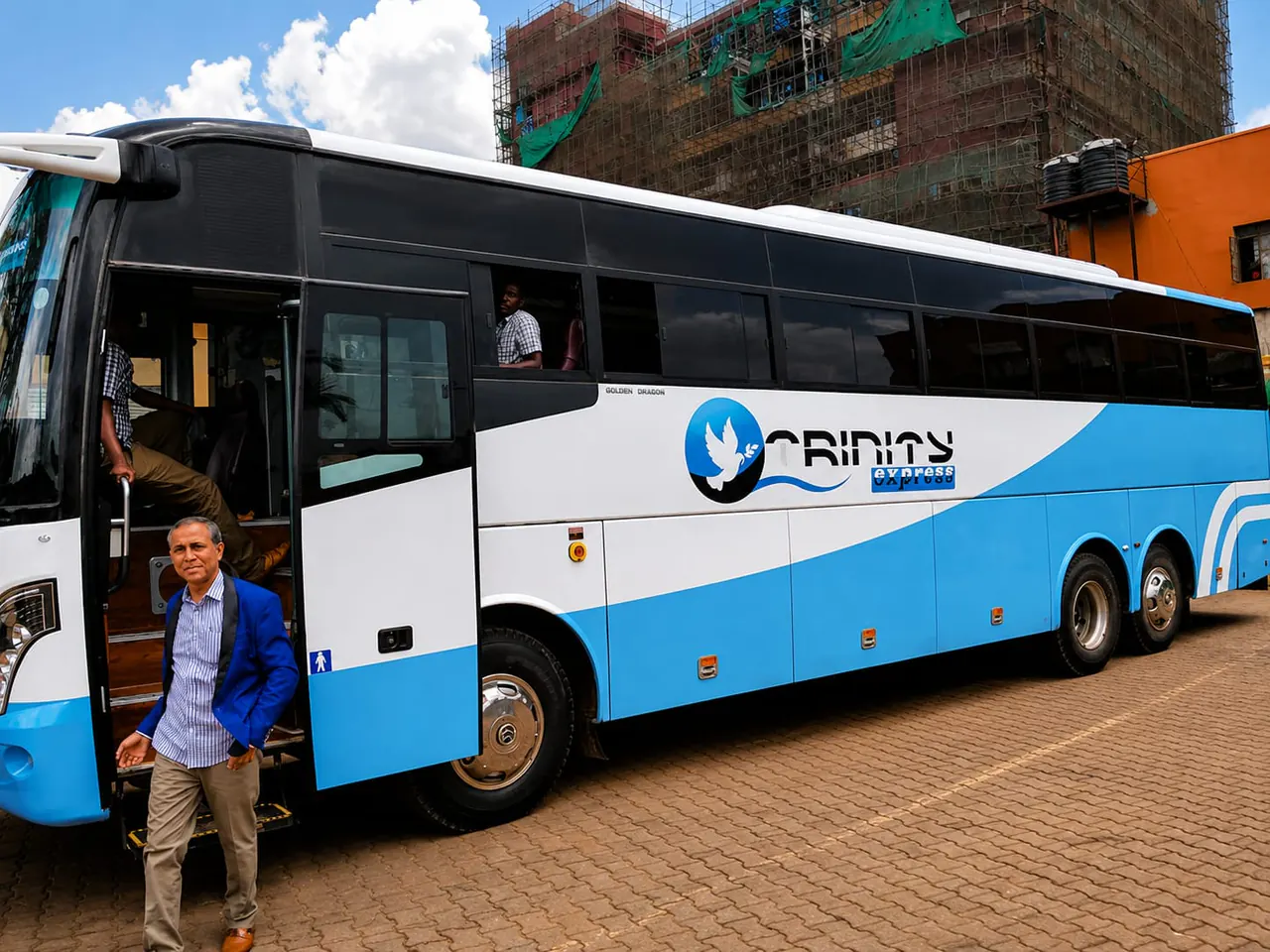 Passenger boarding a Trinity Express coach at the terminal