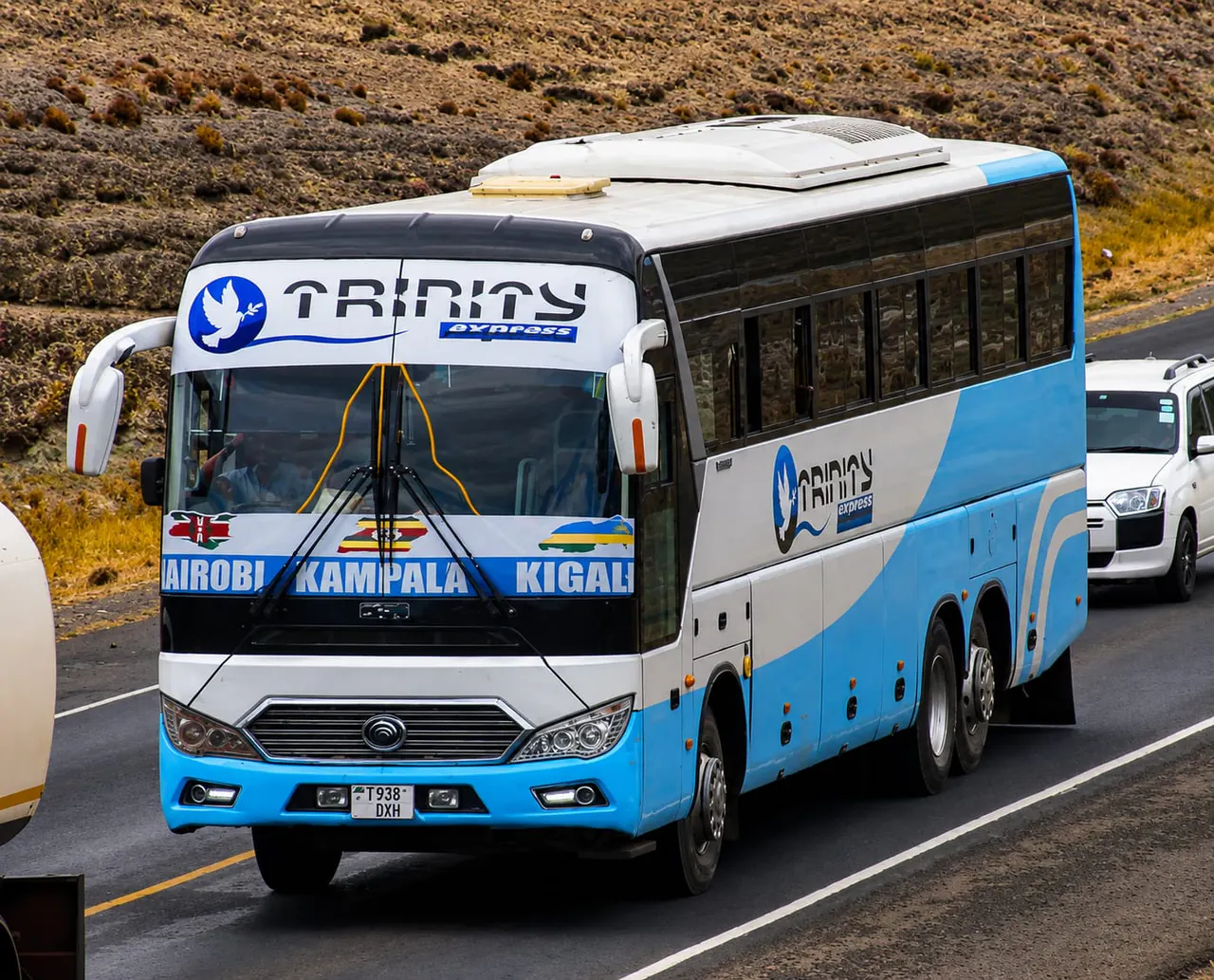 Trinity Express cross-border coach travelling on an East African road
