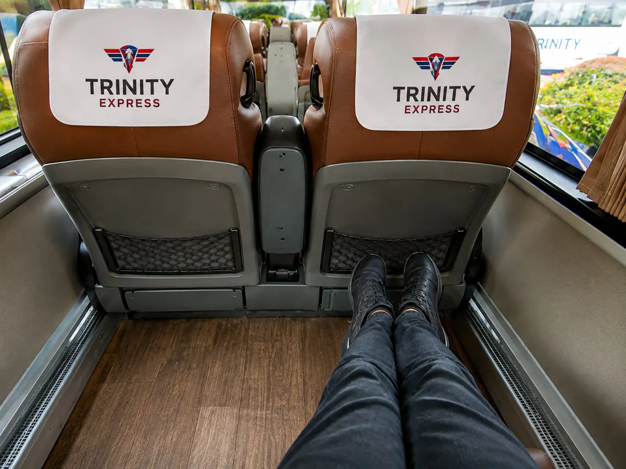 Passenger legroom behind Trinity Express coach seats
