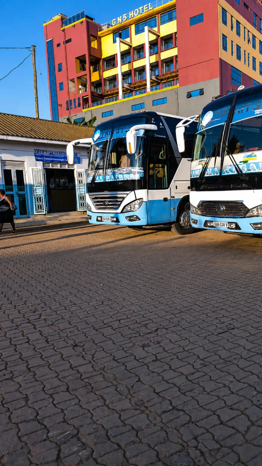 Trinity Express coaches parked outside a city terminal